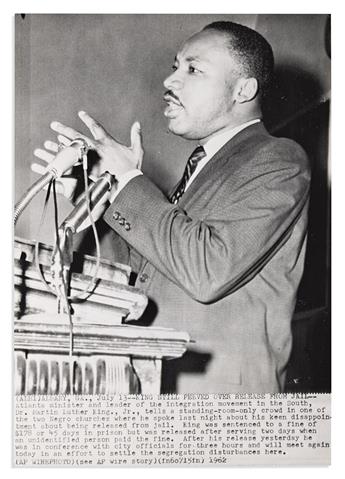 (MARTIN LUTHER KING.) Two photographs of King speaking at civil rights events.